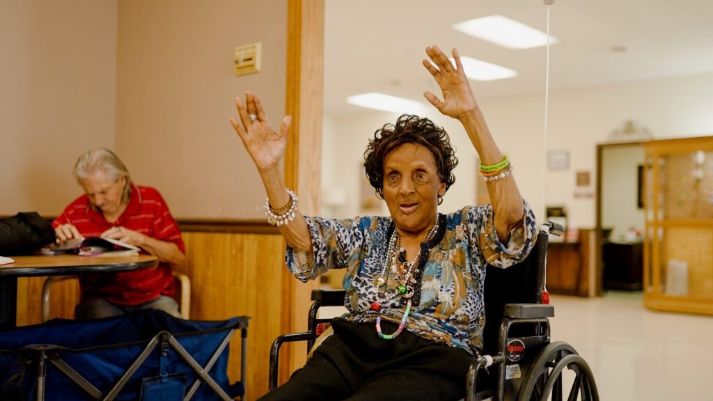 A woman engaging in an activity at Bailey Creek, a skilled nursing facility